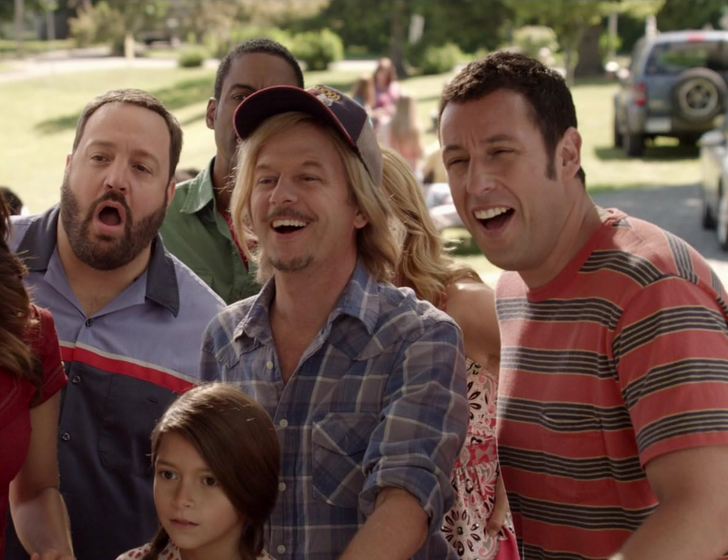Adam Sandler wearing a stripped t-shirt together with other actors on the movie Grown Ups 2